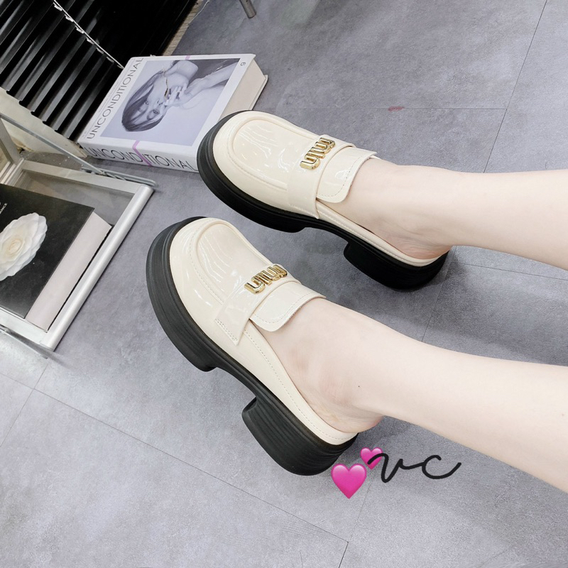 Sục tag các hãng da bóng 2 màu đen kem