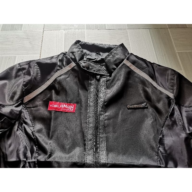 Áo khoác dù phản quang nhập khẩu theo xe Indonesia sản xuất.