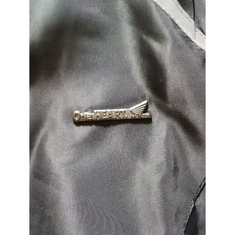 Áo khoác dù phản quang nhập khẩu theo xe Indonesia sản xuất.