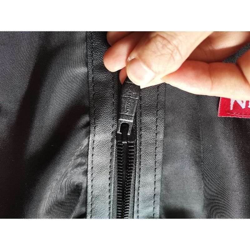 Áo khoác dù phản quang nhập khẩu theo xe Indonesia sản xuất.