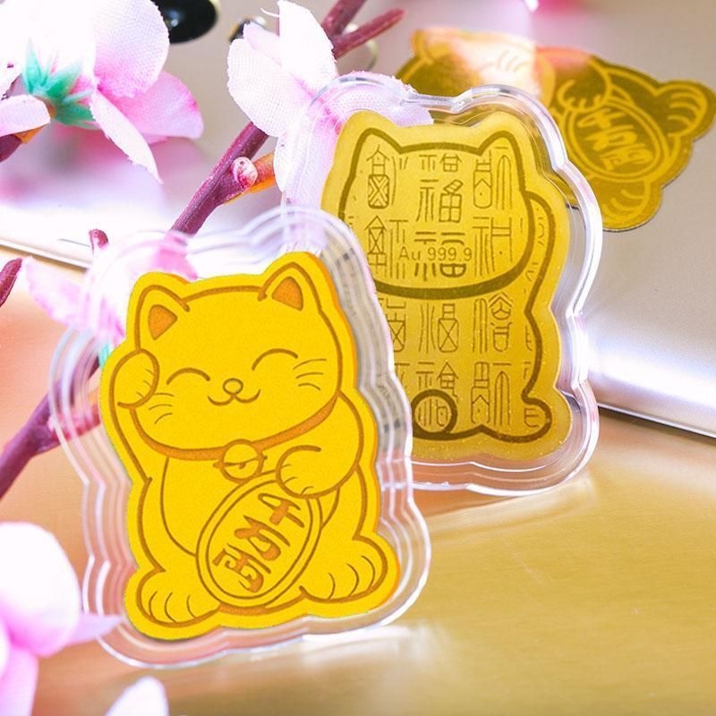 Mèo dán thần tài