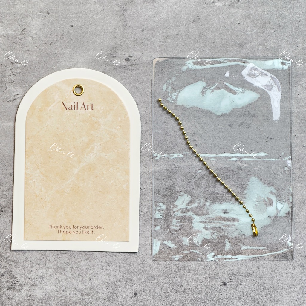 Bìa trưng mẫu nail box có dây treo và lớp bảo vệ chống xước