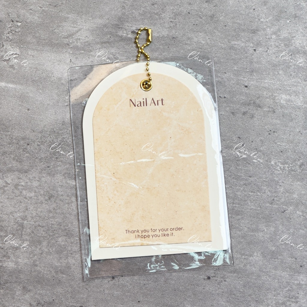 Bìa trưng mẫu nail box có dây treo và lớp bảo vệ chống xước