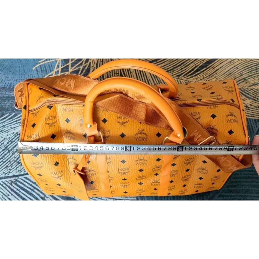 Túi xách tay unisex MCM yellow leather - Gostyle, Túi đeo chéo MCM da nhăn cao cấp