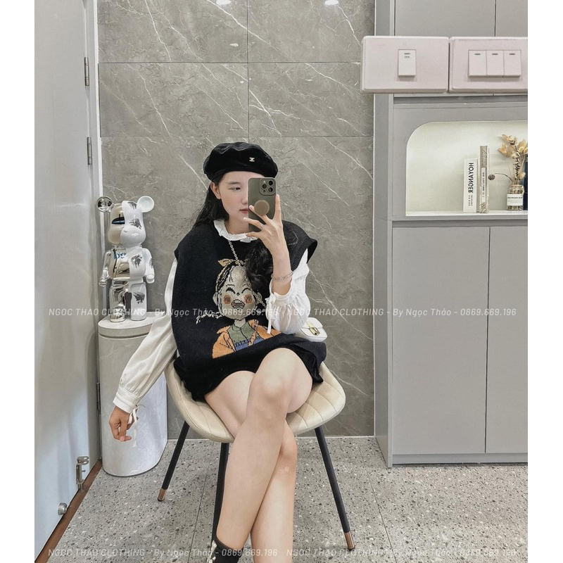 Áo gile len hình cô gái hàng qc