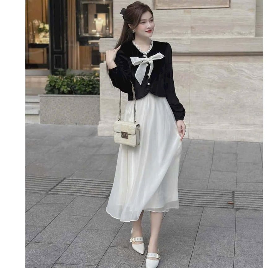 Sét đầm váy nữ áo kiểu tay dài, gài nút đính nơ mix chân váy xòe dài đậm chất tiểu thư dành cho các nàng đi tiệc xinh.