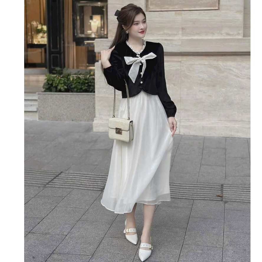 Sét đầm váy nữ áo kiểu tay dài, gài nút đính nơ mix chân váy xòe dài đậm chất tiểu thư dành cho các nàng đi tiệc xinh.