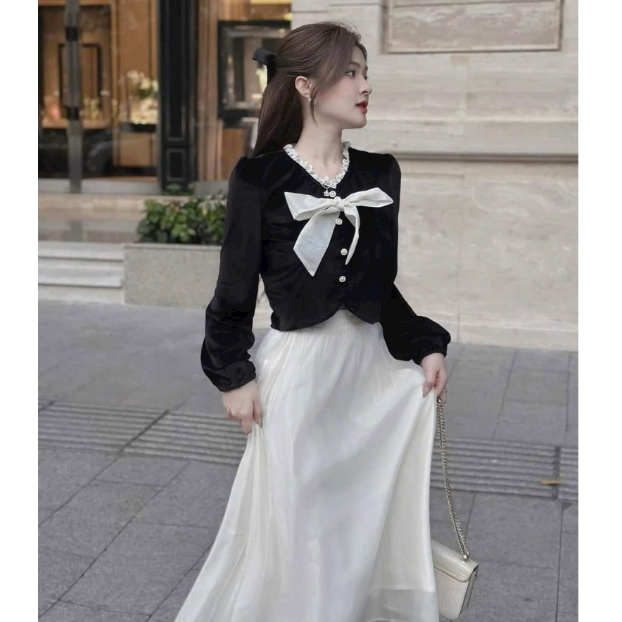 Sét đầm váy nữ áo kiểu tay dài, gài nút đính nơ mix chân váy xòe dài đậm chất tiểu thư dành cho các nàng đi tiệc xinh.