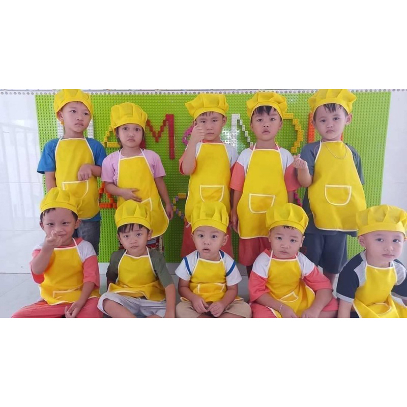 Tạp dề và mũ cho bé có 7 màu chất liệu 2 lớp kèm mũ