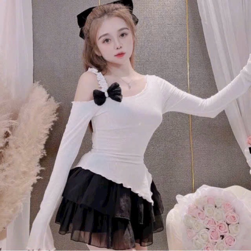 Áo kiểu lệch vai đính nơ vạt chéo tay dài dáng tiểu thư dễ mặc