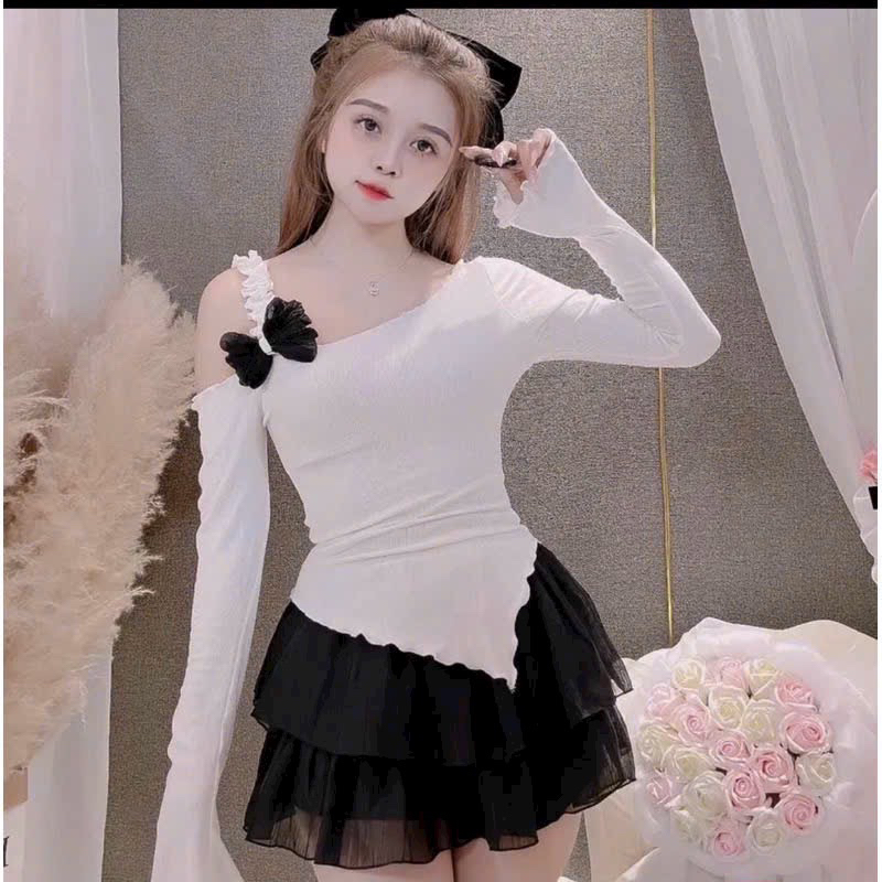 Áo kiểu lệch vai đính nơ vạt chéo tay dài dáng tiểu thư dễ mặc
