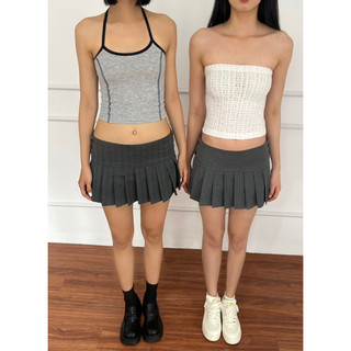 CHÂN VÁY XẾP LY CẠP TRỄ GÀI NÚT