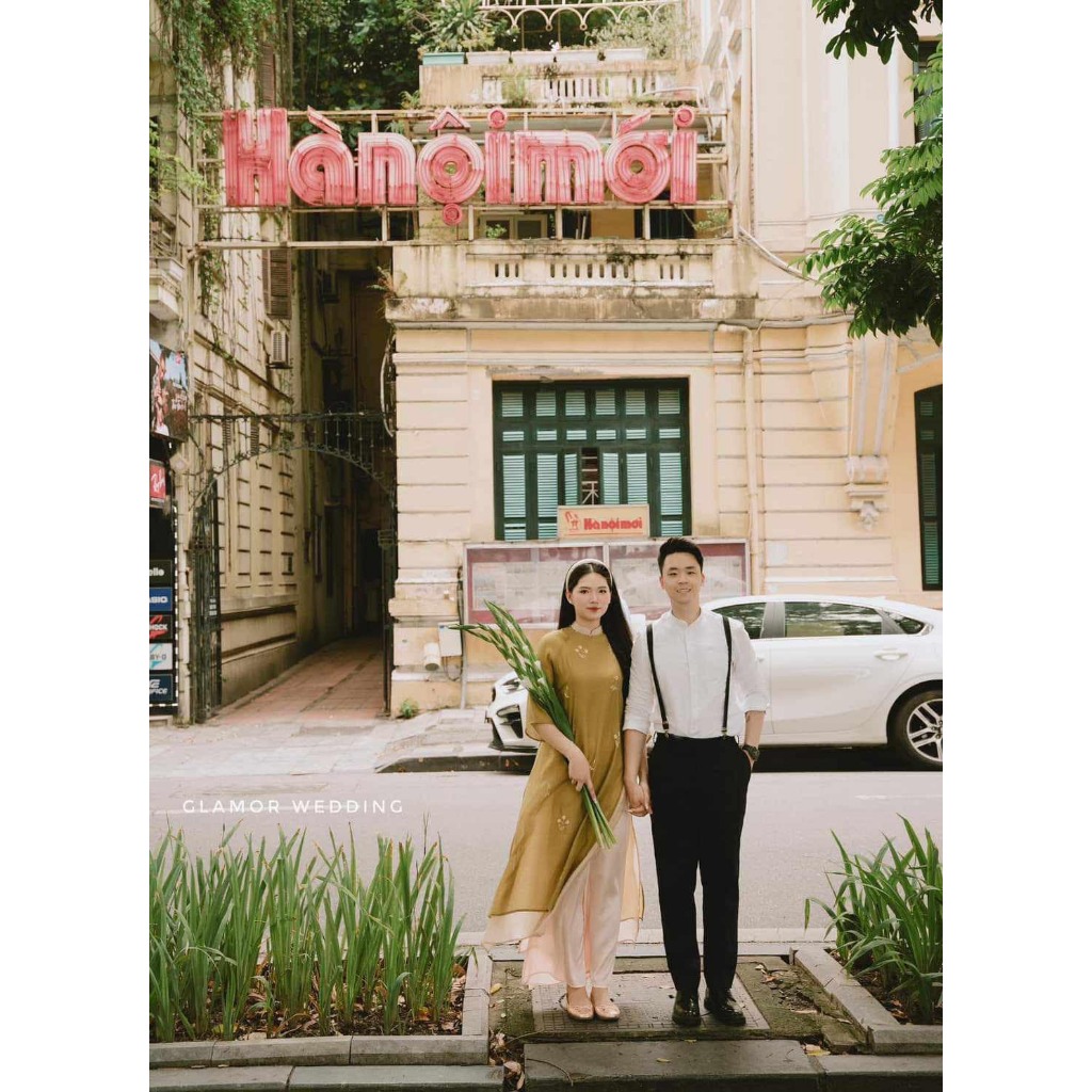Áo dài dáng xuông thêu hoa cúc chi