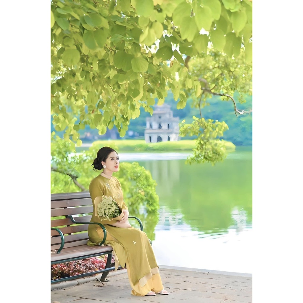 Áo dài dáng xuông thêu hoa cúc chi