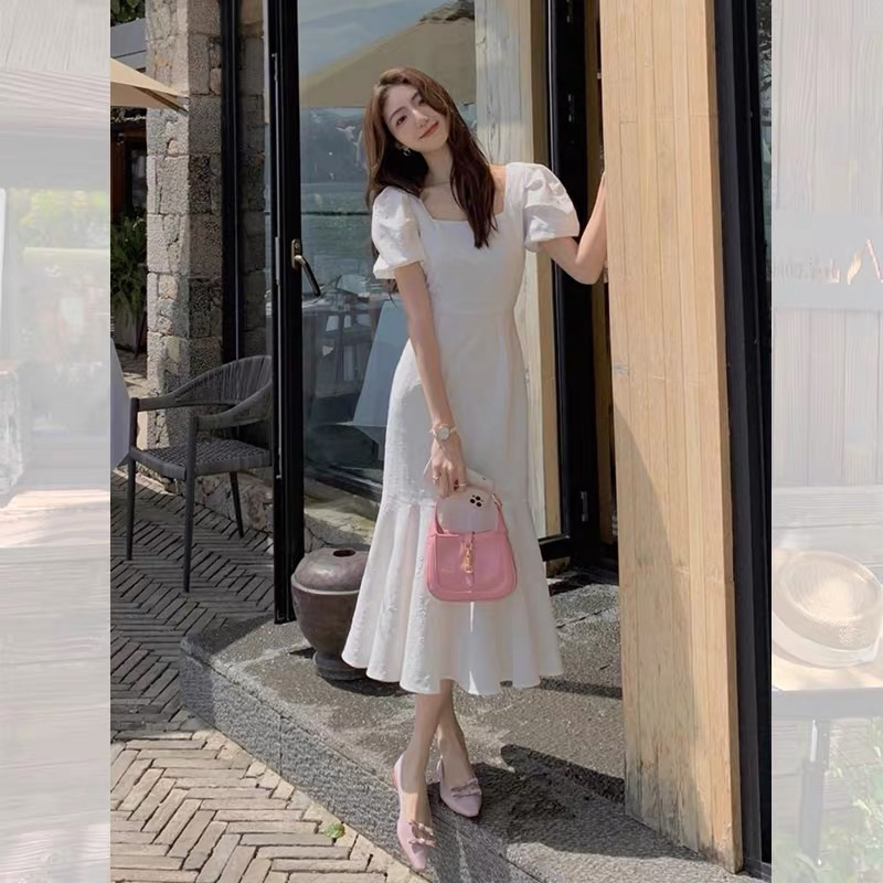 Đầm vây cổ vuông đuôi cá tím pastel nhẹ nhàng