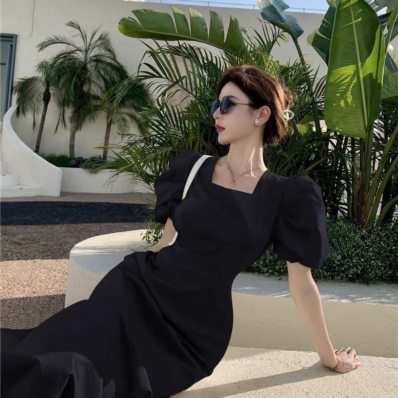 Đầm vây cổ vuông đuôi cá tím pastel nhẹ nhàng