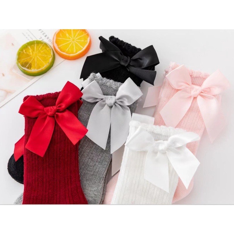 Tất vớ dài cao cổ đính nơ cho bé 0 đến 3 tuổi siêu yêu , dautayshop.vn