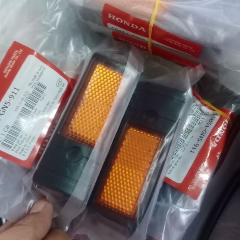 Nắp ốp  bên phuộc xe máy DREAM
