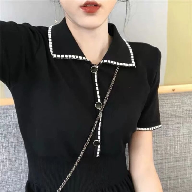 Đầm len mtg đen phối nút giả QC