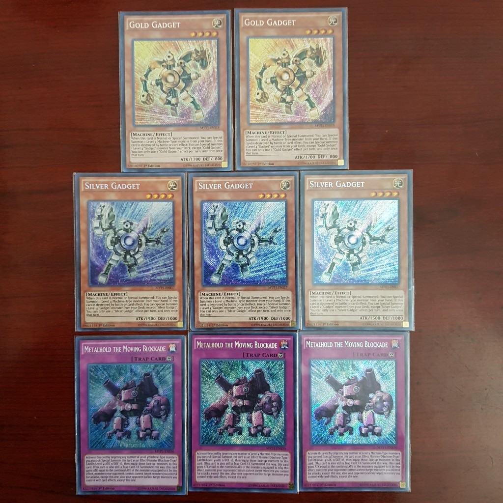 1 sét Lá thẻ bài Gold Gadget - Silver Gadget - Metalhold the Moving Blockade - MVP1-ENS30 - Secret Rare 1st Edition