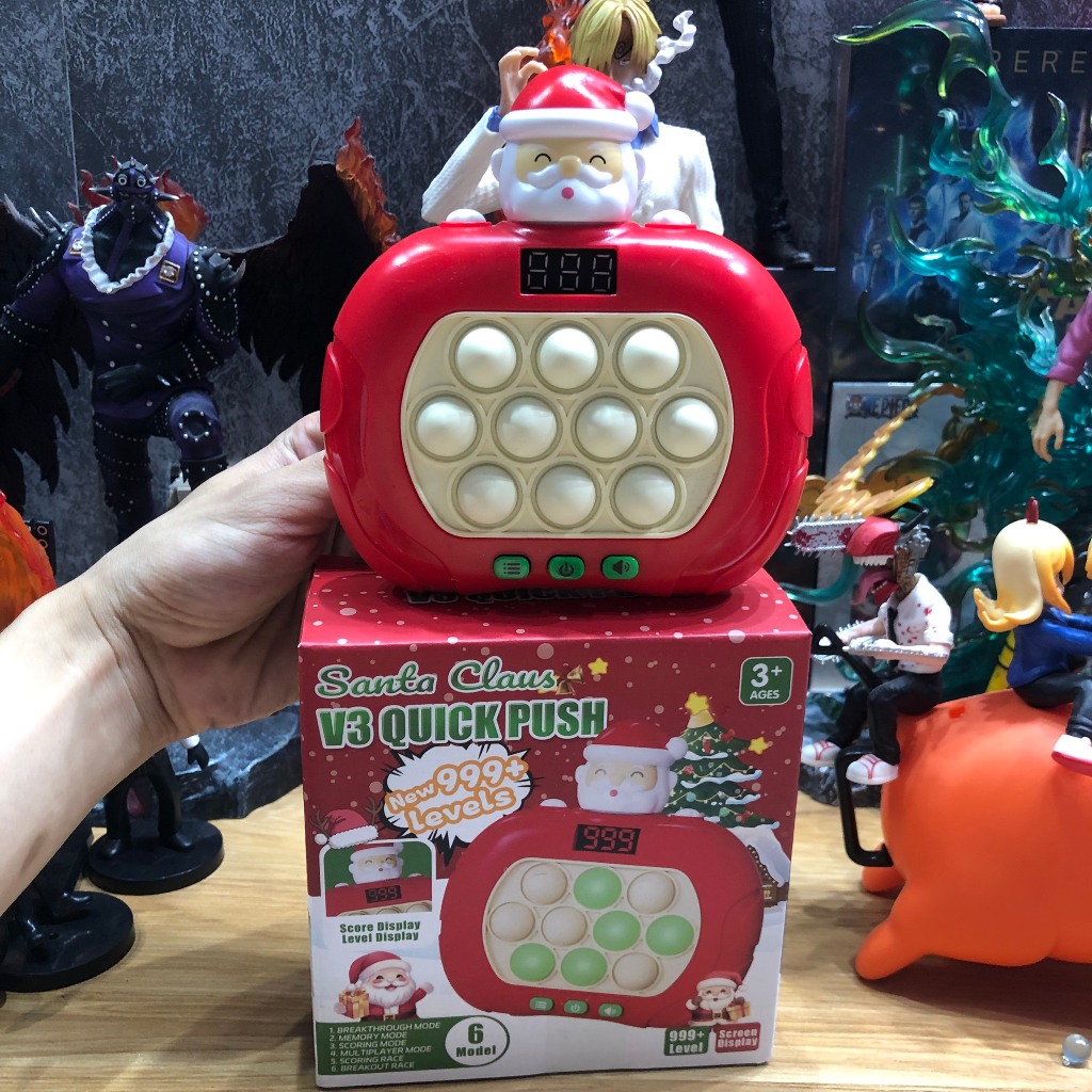 Đồ chơi Pop it ông già Noel thế hệ mới - máy điện tử chơi game thế hệ mới - giải trí bấm nút theo đèn nhạc