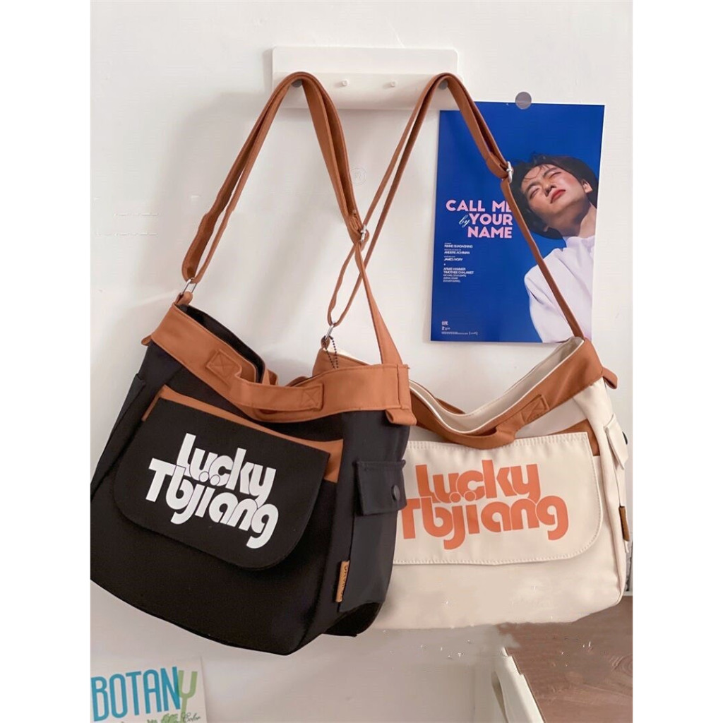 Túi đeo chéo canvas lucky phối dây nâu nhiều ngăn đi chơi, đi học