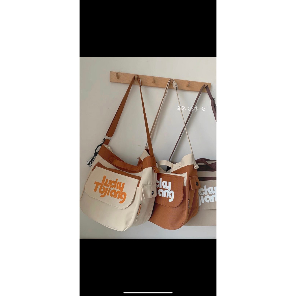 Túi đeo chéo canvas lucky phối dây nâu nhiều ngăn đi chơi, đi học