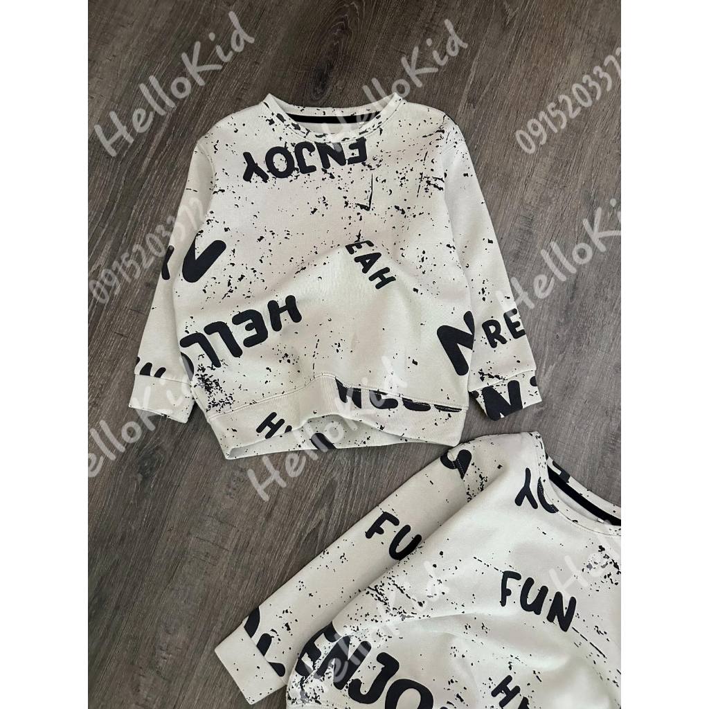 Áo nỉ chữ vảy sơn cho bé