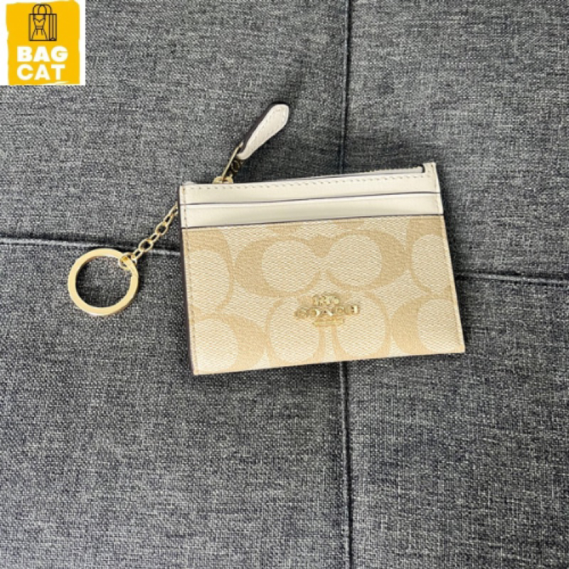 Sẵn Ví đựng thẻ kèm móc khoá Mini Skinny Id Case In Signature Canvas
