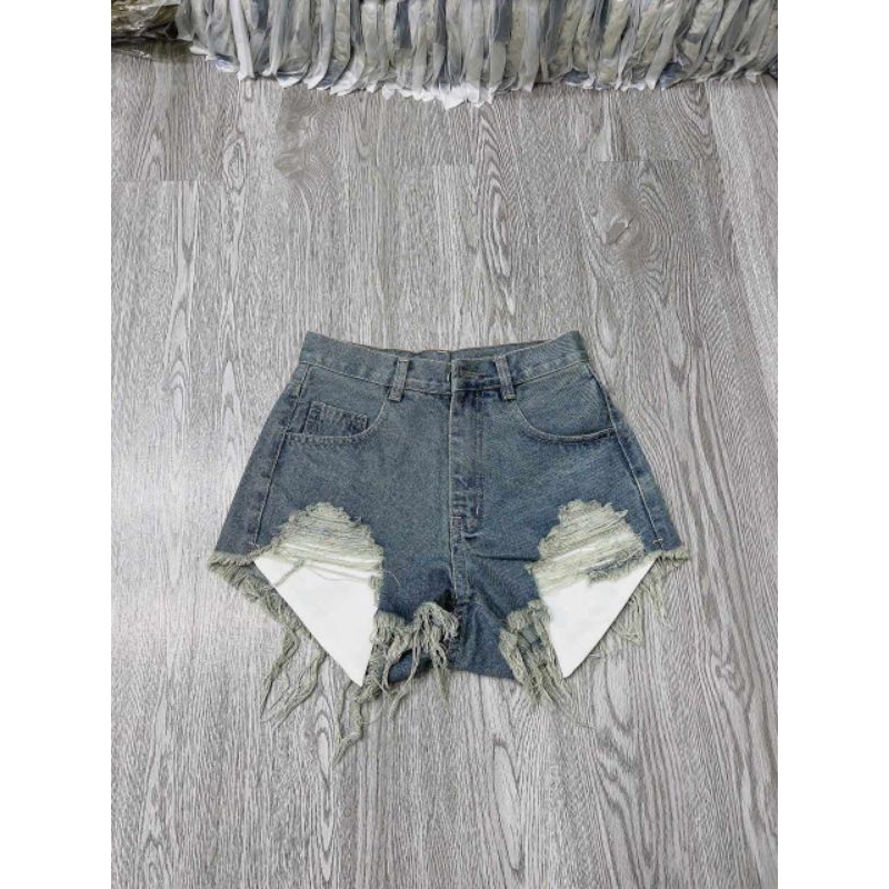 Quần short denim rách lưng cao phối túi tua rua