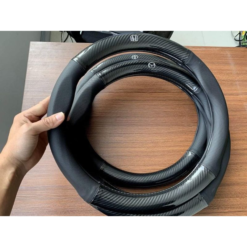 Bọc Vô Lăng Ô Tô Cacbon 4S Cao Cấp Có Logo Các Hãng Xe