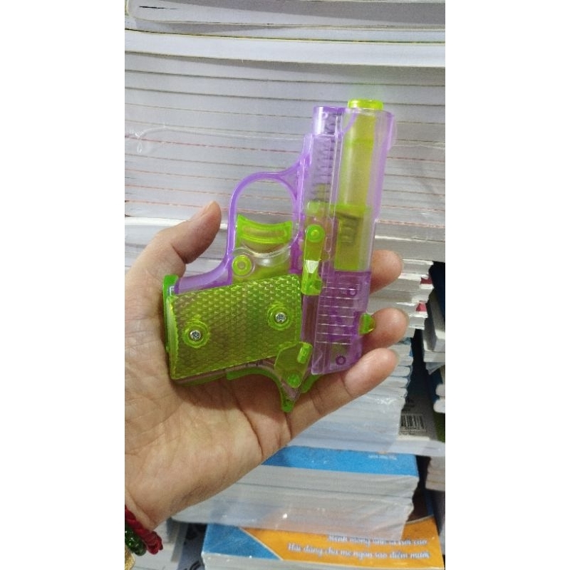 Súng đồ chơi carot phát sáng, an toàn cho bé.