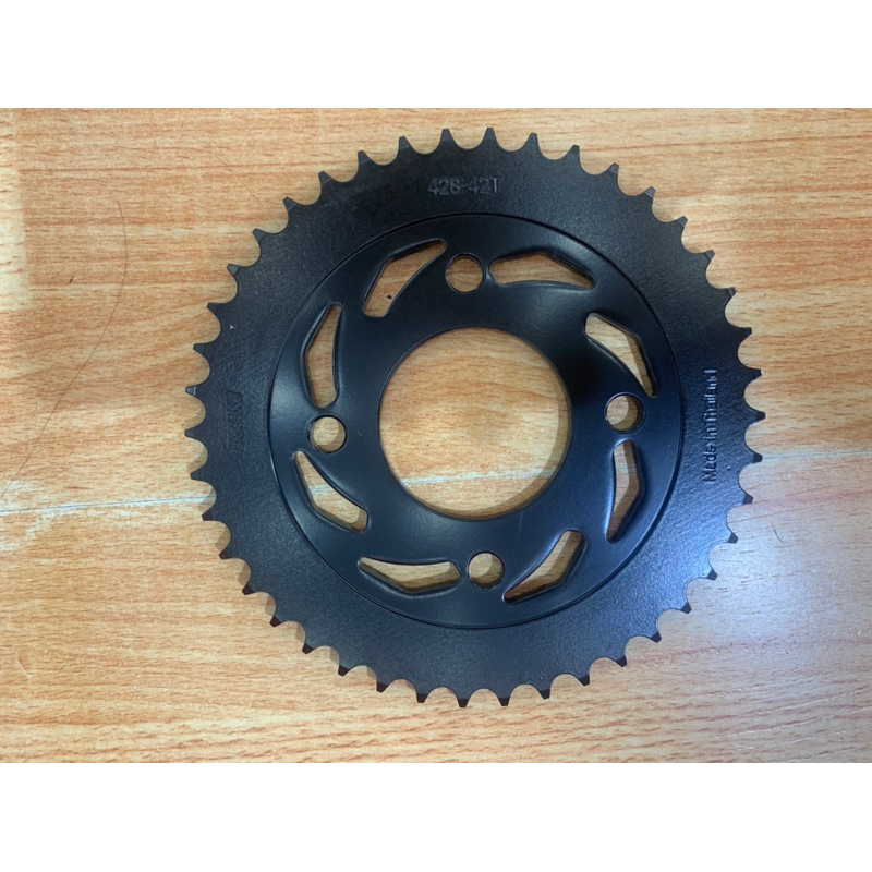 Nhông sên dĩa titan cho Axelo.