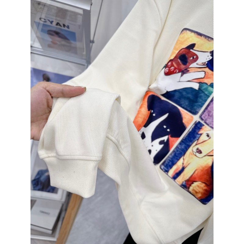 Set Áo Tăm Thun Kem Dài Tay In Hoạt Hình Phối Quần Thụng Đen Bo Gấu