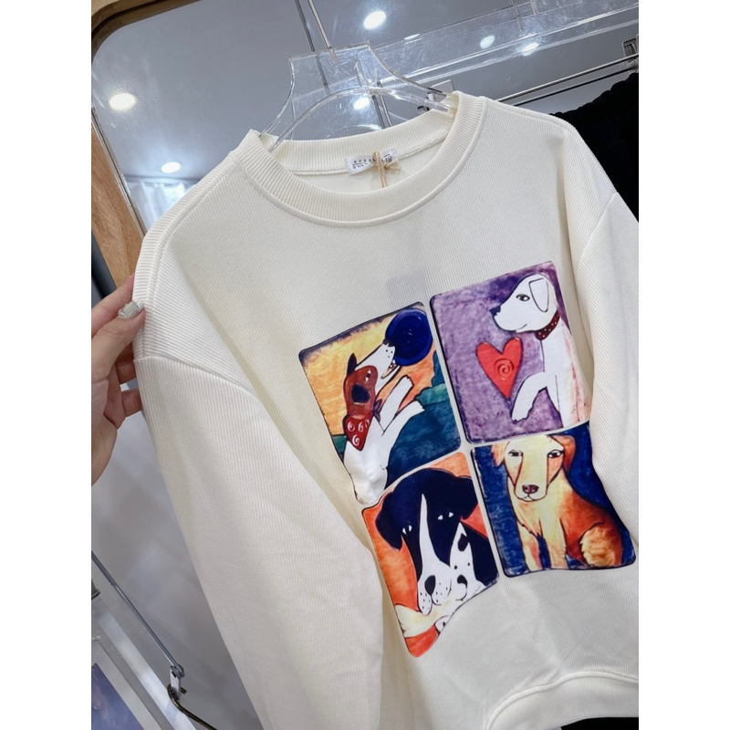 Set Áo Tăm Thun Kem Dài Tay In Hoạt Hình Phối Quần Thụng Đen Bo Gấu