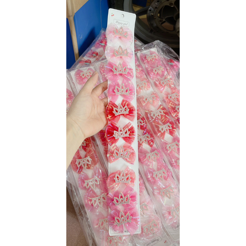 Sỉ 1 dây kẹp nơ ren có gắn vương miện cho bé gái