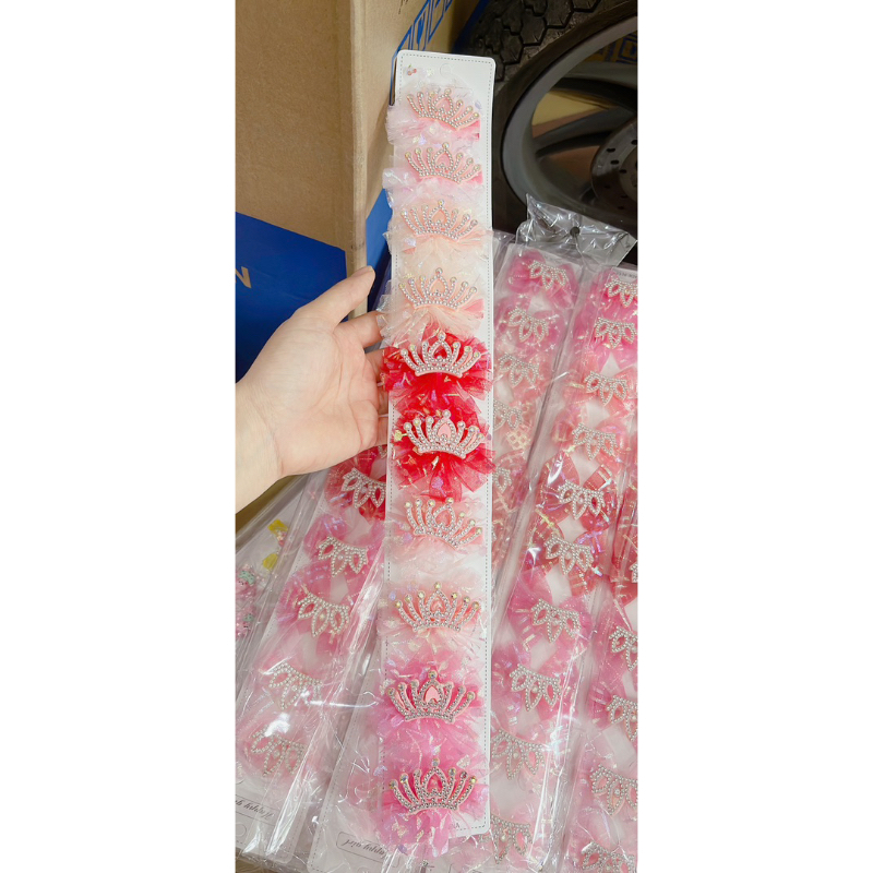 Sỉ 1 dây kẹp nơ ren có gắn vương miện cho bé gái