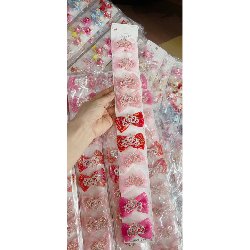 Sỉ 1 dây kẹp nơ ren có gắn vương miện cho bé gái