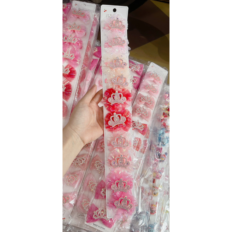 Sỉ 1 dây kẹp nơ ren có gắn vương miện cho bé gái