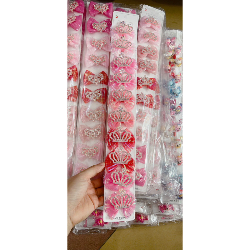 Sỉ 1 dây kẹp nơ ren có gắn vương miện cho bé gái