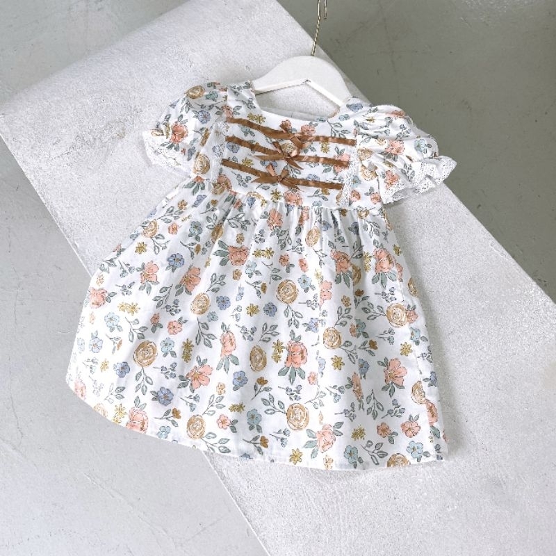 Váy babydoll hoa nhí nơ ngực