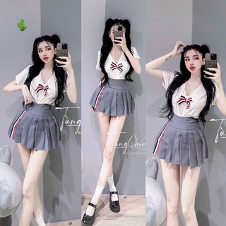 Set bộ áo thun cổ tim đính nơ kèm chân váy tennis xếp ly