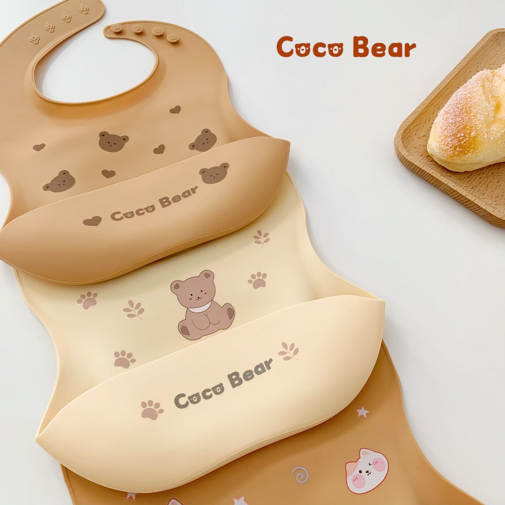 Yếm silicone Coco Bear cho bé mới tập ăn dặm, có máng hứng rộng nhiều hình nghộ nghĩnh