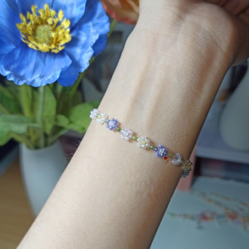 Vòng tay hạt cườm gạo kết hoa nhí kiểu Hàn màu tím