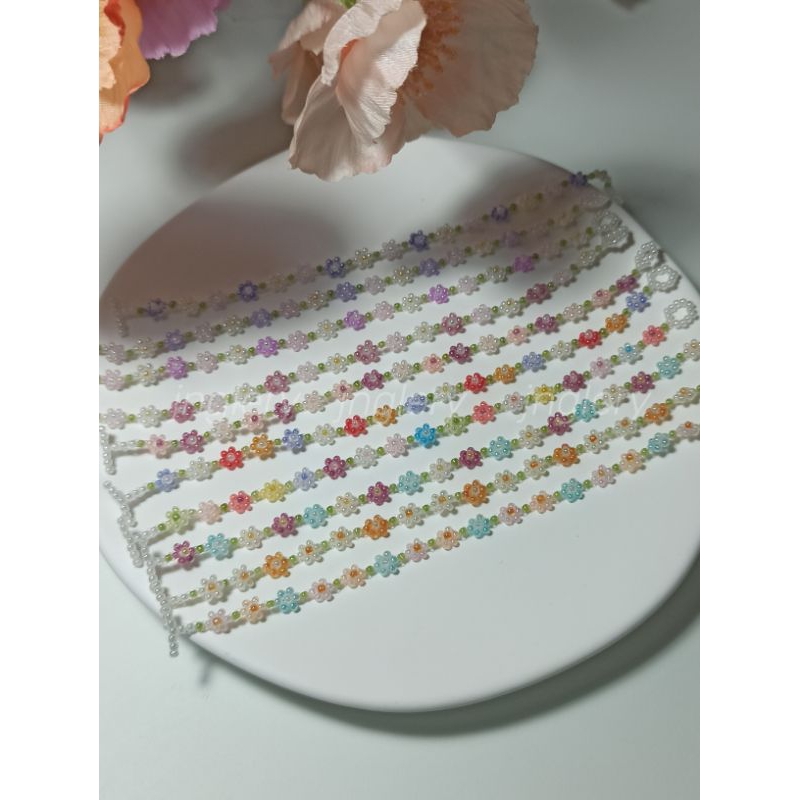 Vòng tay hạt cườm gạo kết hoa nhí kiểu Hàn màu tím