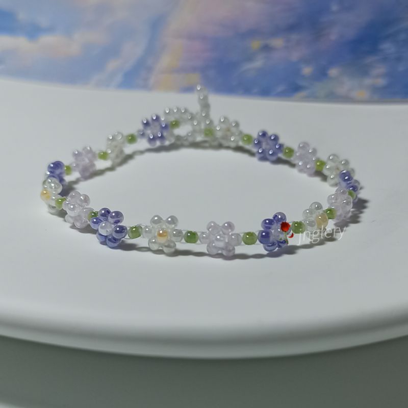 Vòng tay hạt cườm gạo kết hoa nhí kiểu Hàn màu tím