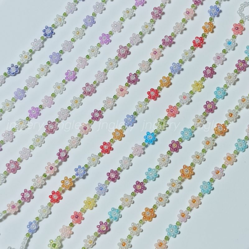 Vòng tay hạt cườm gạo kết hoa nhí kiểu Hàn màu tím