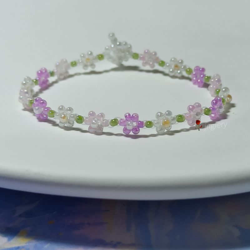 Vòng tay hạt cườm gạo kết hoa nhí kiểu Hàn màu tím