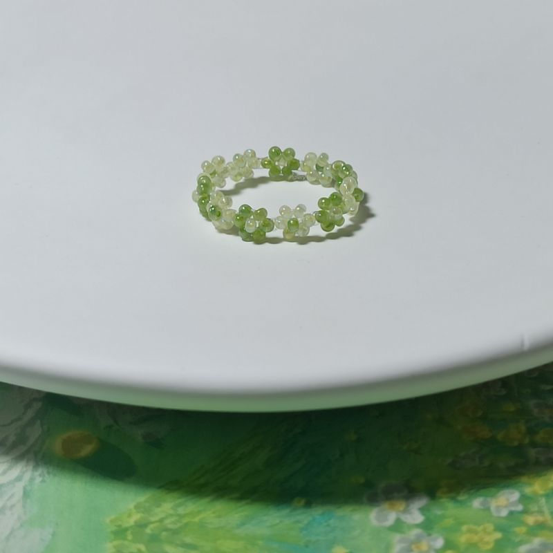 Nhẫn hạt cườm gạo kết hoa nhí