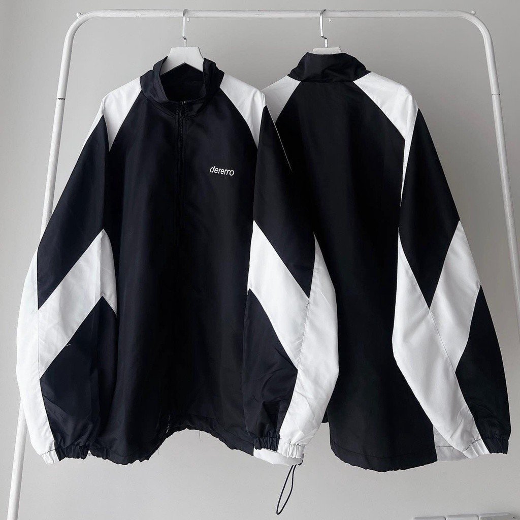 Áo Khoác Dù Dererro Logo Thêu Màu Kem Vải Gió Unisex Form Rộng Nam Nữ